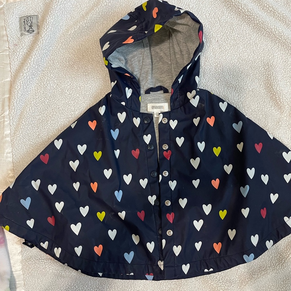 Gymboree navy poncho adorned with hearts.